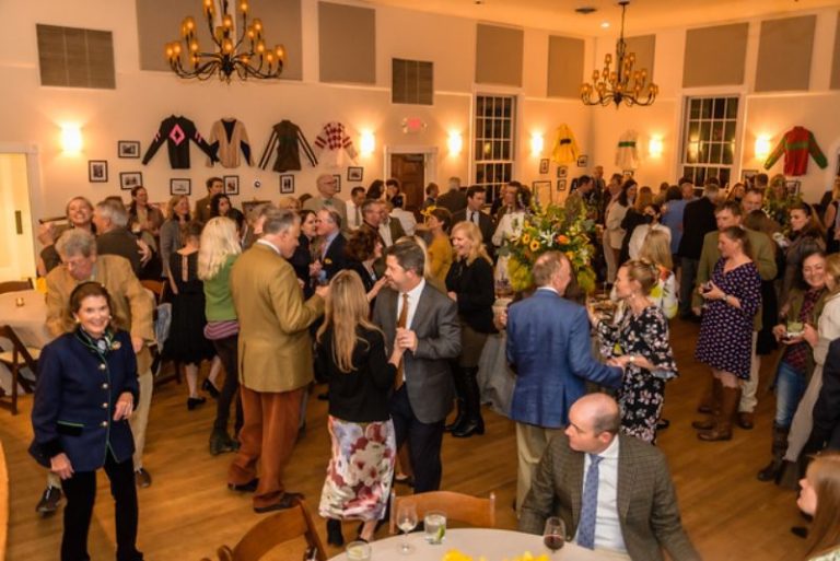 group of people at a dance - dancing and talking